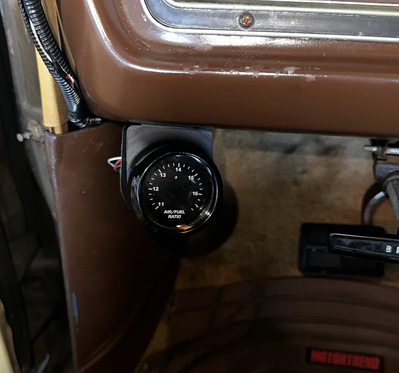 3D-printed gauge pod mounted in a car